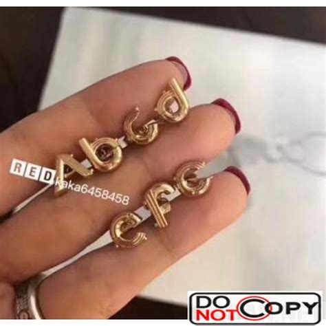 louis vuitton small earrings|louis vuitton alphabet earrings.